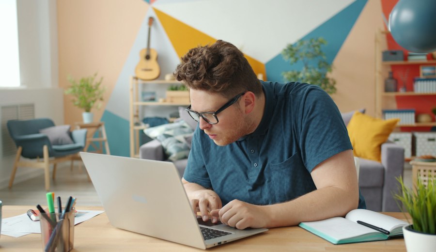 Man reviewing coverage on a laptop