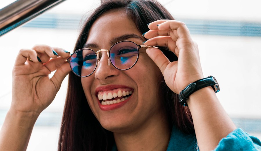 Woman trying on new glasses